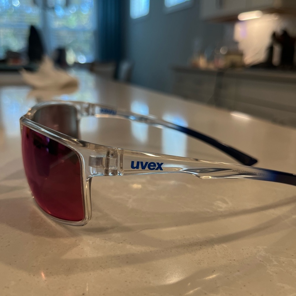 Uvex women’s sunglasses- pink and blue lenses.